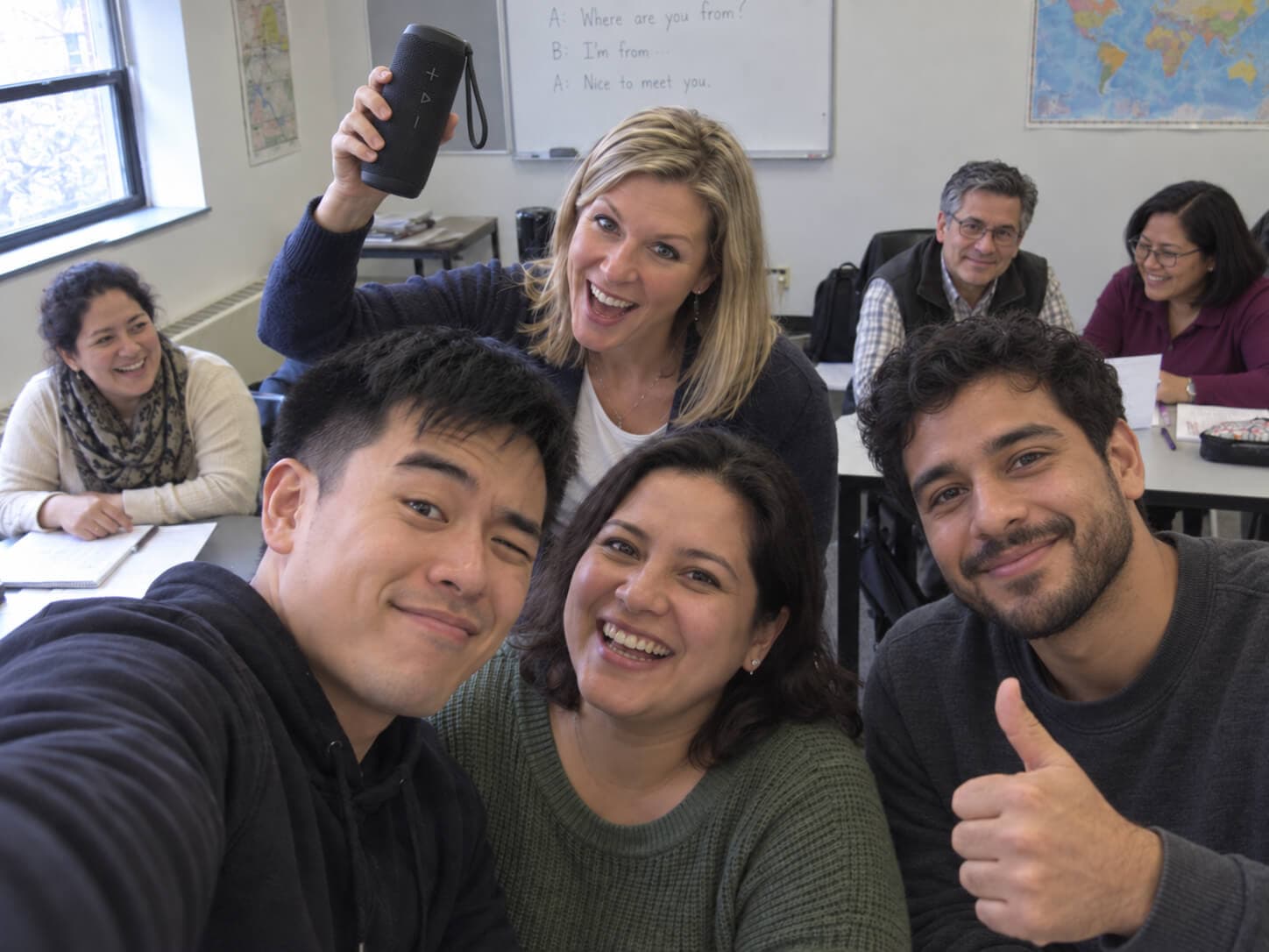Cheryl Orlassino, Teacher. Cheryl Orlassino (with the speaker) and the class